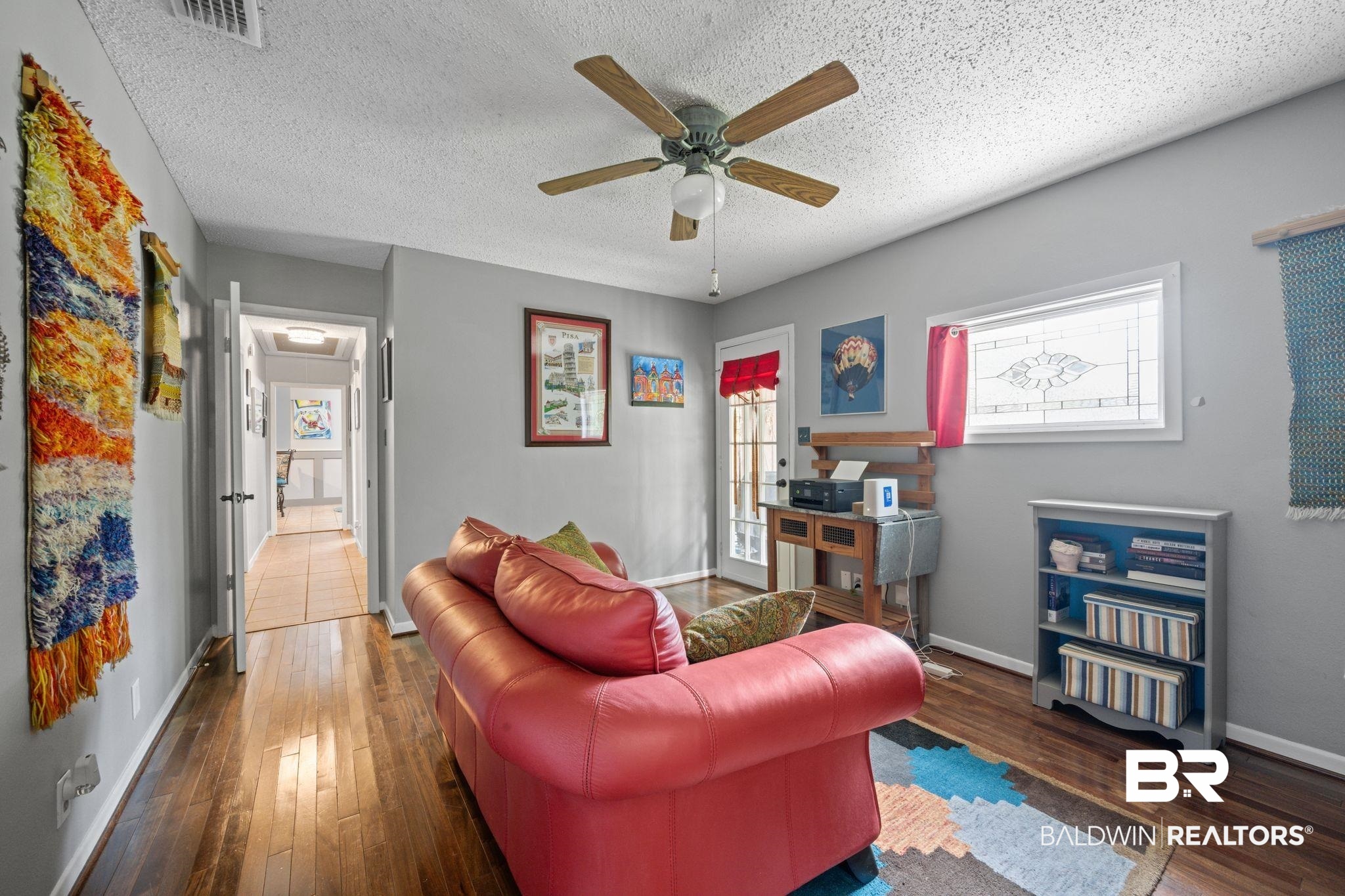 40 Caisson Trace Daphne, AL 36527 - Photo 22 of 54 Den featuring ceiling fan and dark tile patterned floors