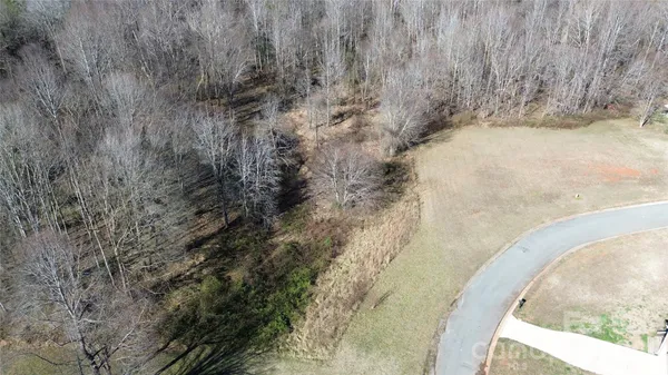 a view of a dry yard in the background