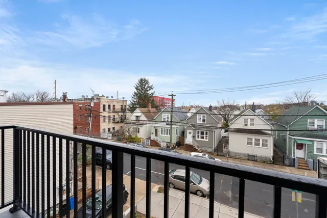 a view of a city from a balcony