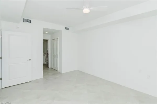 a bathroom with a sink and vanity