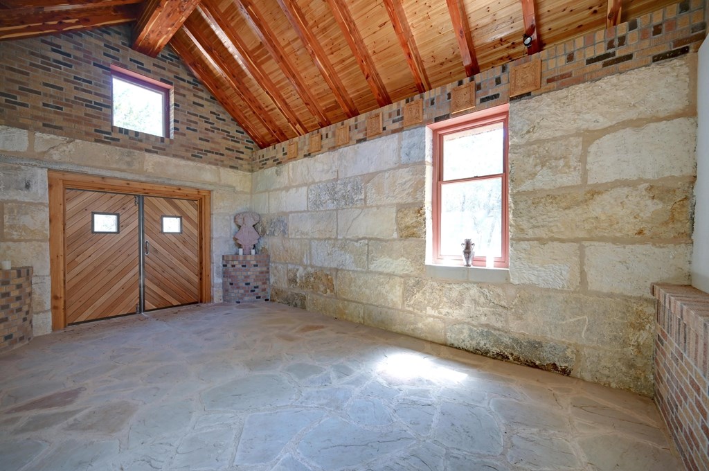 324 East Headwaters Ranch Road Kendalia, TX 78027 - Photo 50 of 61 a view of an empty room with a window