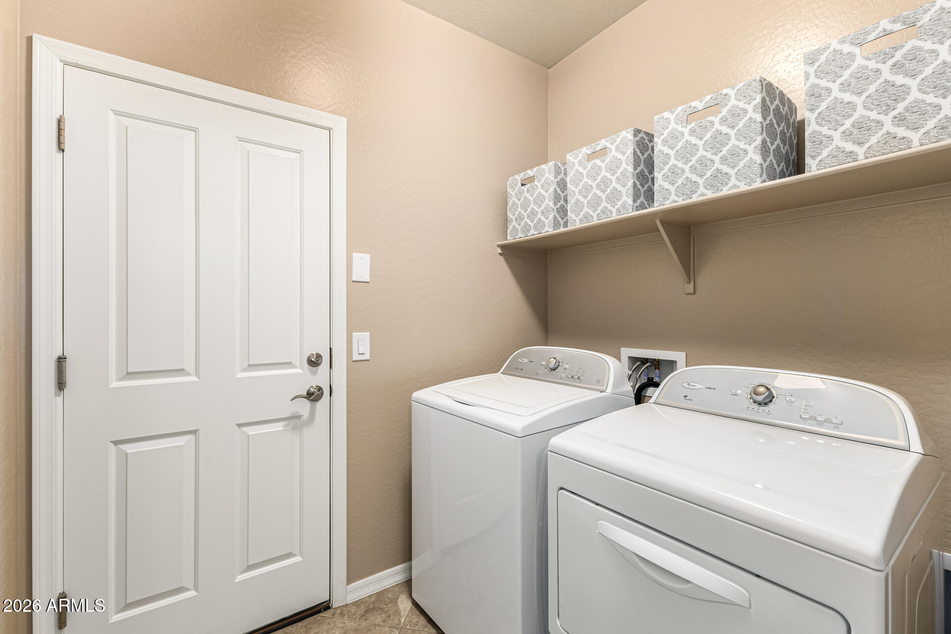 20594 West White Rock Road Buckeye, AZ 85396 - Photo 22 of 38 a utility room with dryer and washer
