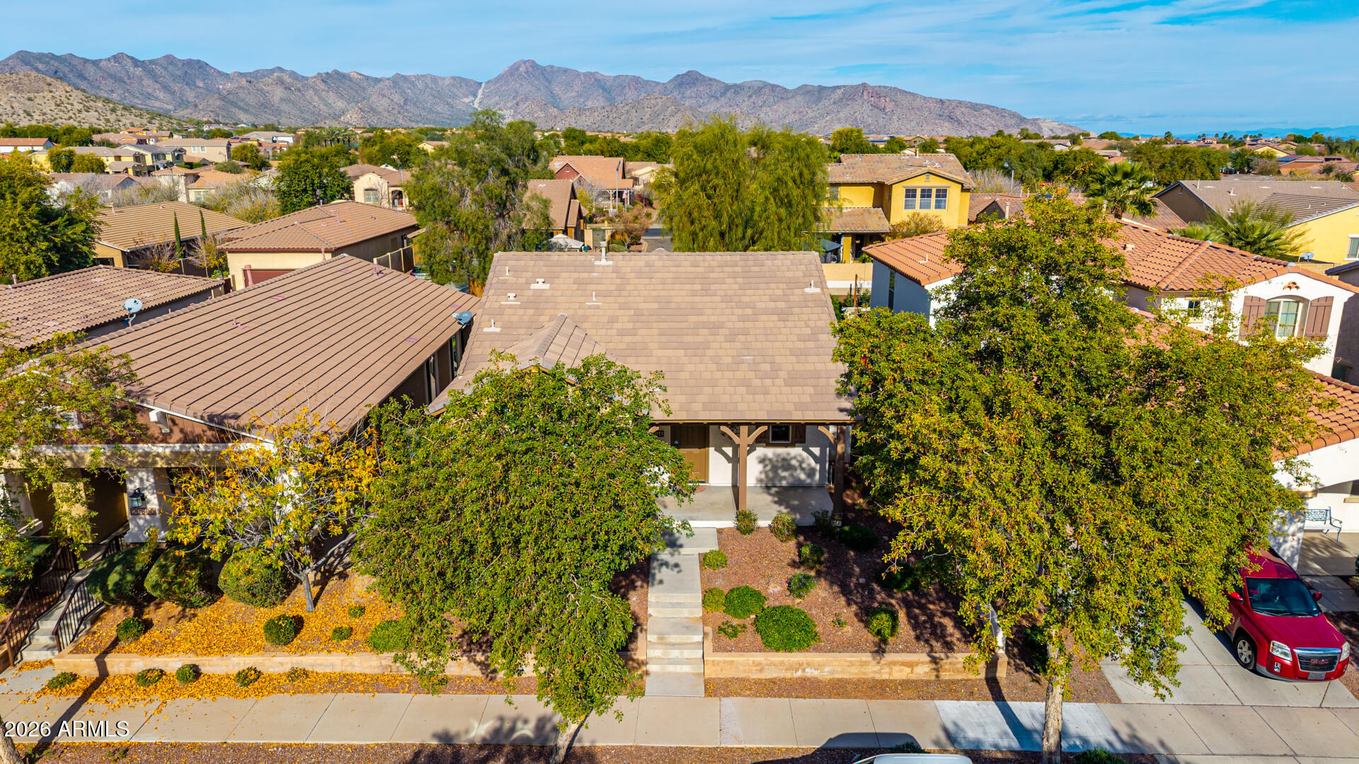 20594 West White Rock Road Buckeye, AZ 85396 - Photo 34 of 38 an aerial view of residential houses with outdoor space and street view