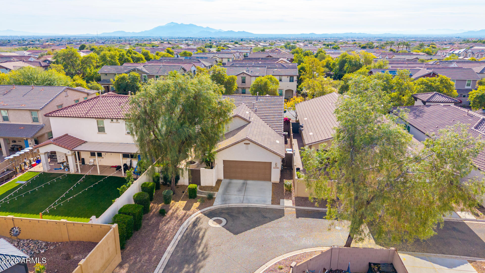 20594 West White Rock Road Buckeye, AZ 85396 - Photo 35 of 38 an aerial view of a house with a garden