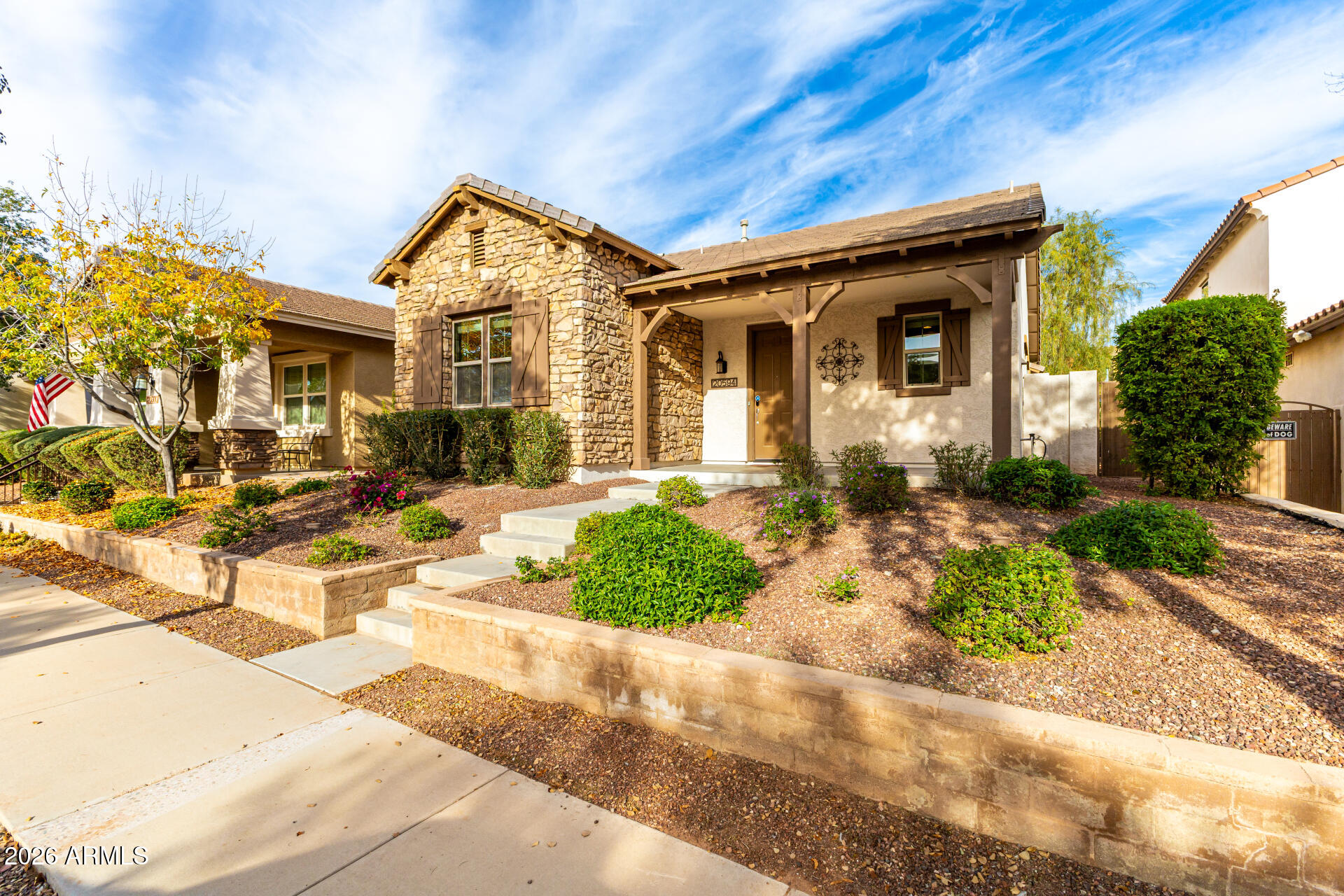 20594 West White Rock Road Buckeye, AZ 85396 - Photo 36 of 38 a front view of a house with a yard