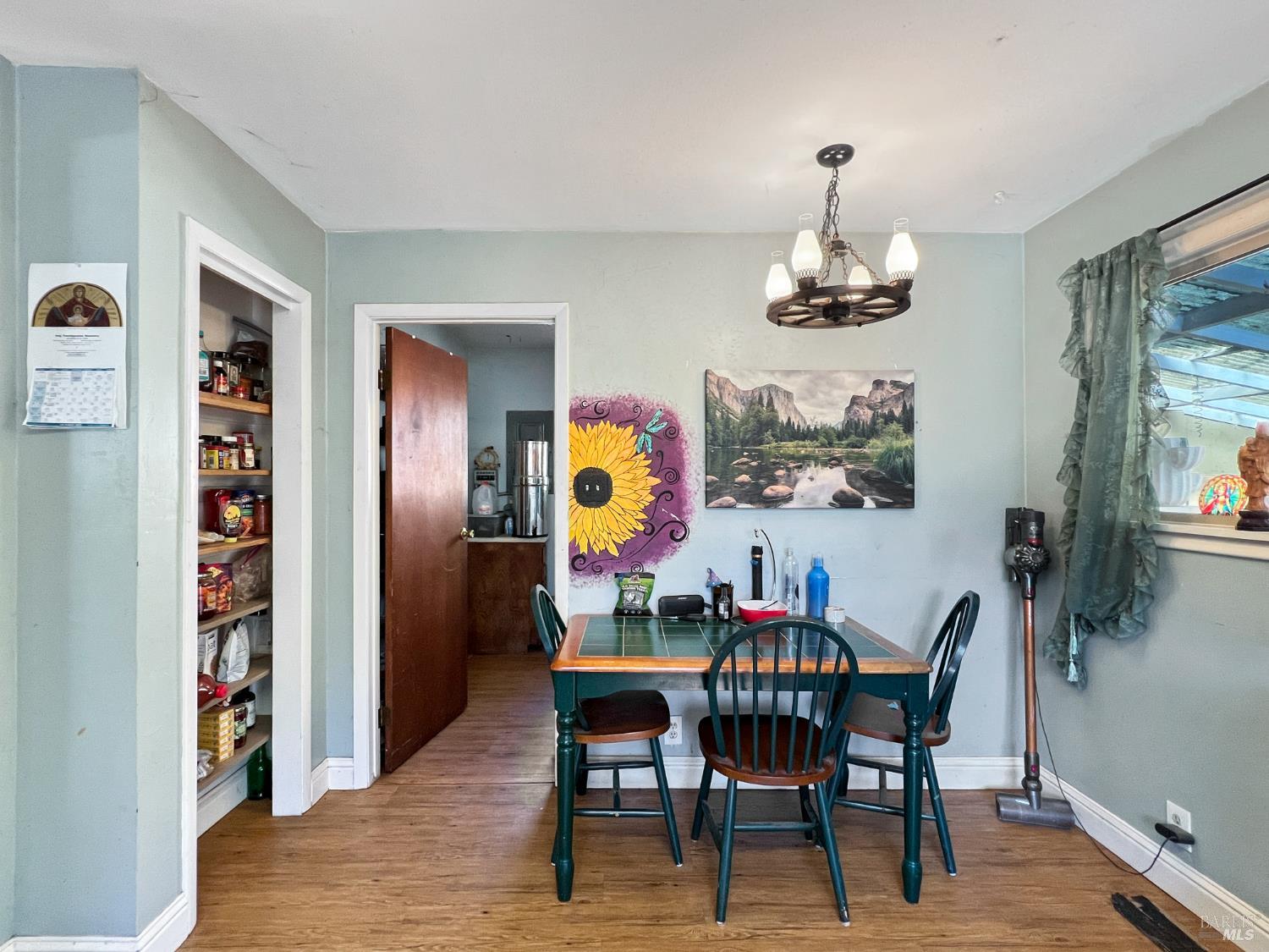 8600 Cave Creek Road Redwood Valley, CA 95470 - Photo 5 of 11 a dining room with furniture and window