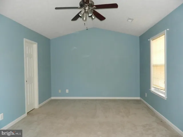 a view of a room with a window