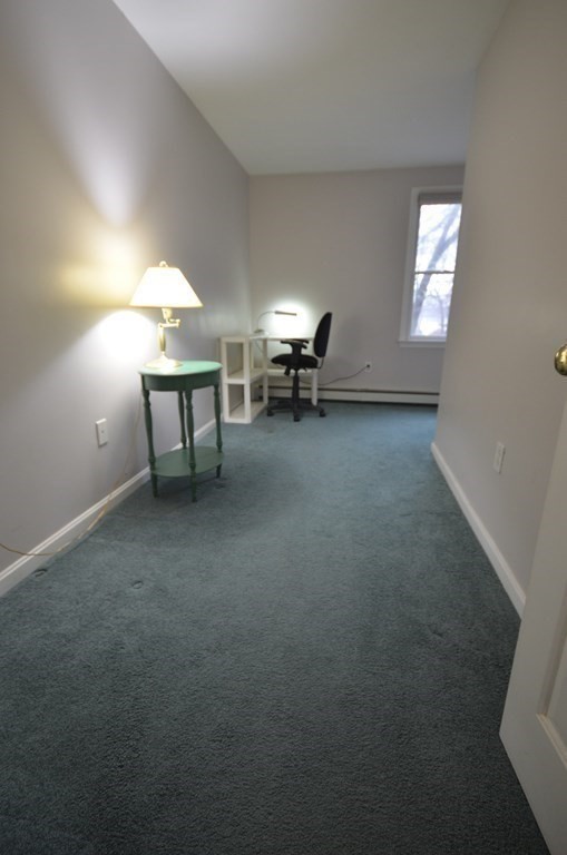 12 Leon Road Holbrook, MA 02343 - Photo 16 of 23 a view of a room with windows and lounge chair
