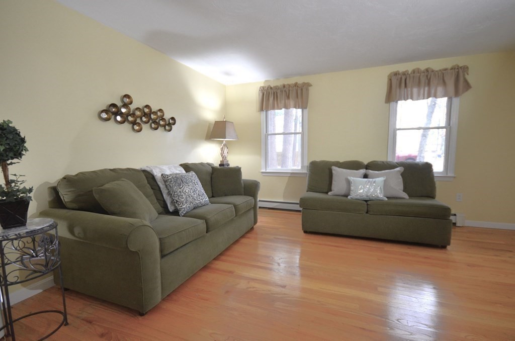 12 Leon Road Holbrook, MA 02343 - Photo 8 of 23 a living room with furniture and window