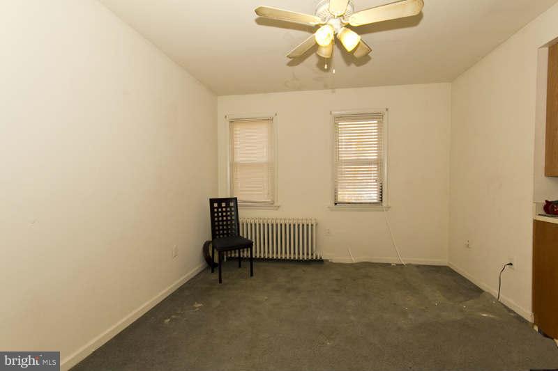 509 Kingston Road Baltimore, MD 21229 - Photo 14 of 17 a room with a window