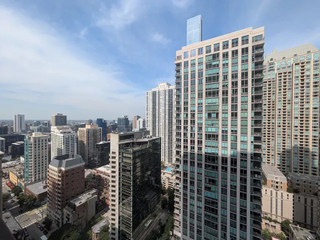 a view of a city with tall buildings