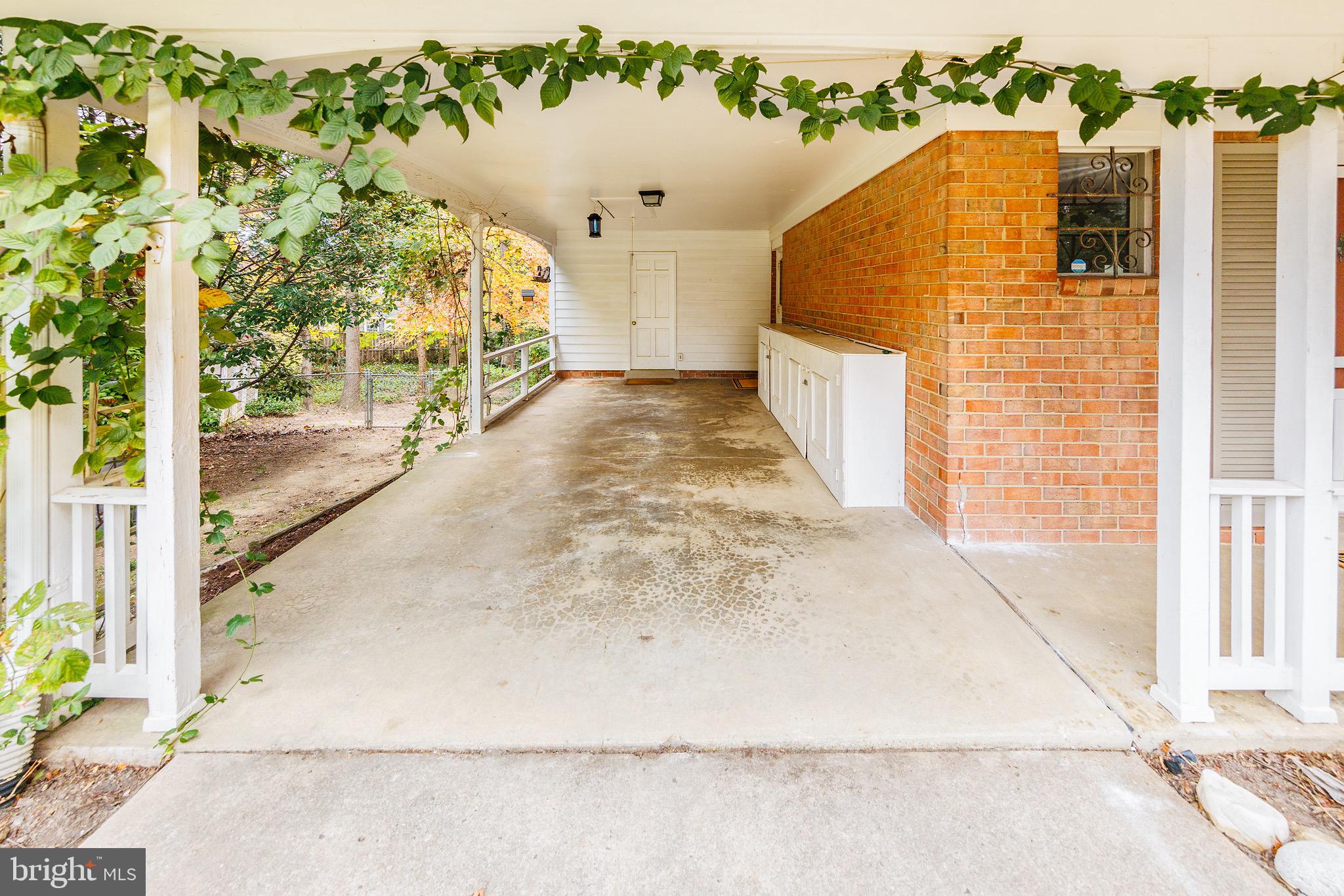 6800 Quebec Court Springfield, VA 22152 - Photo 2 of 44 spacious carport with extra storage