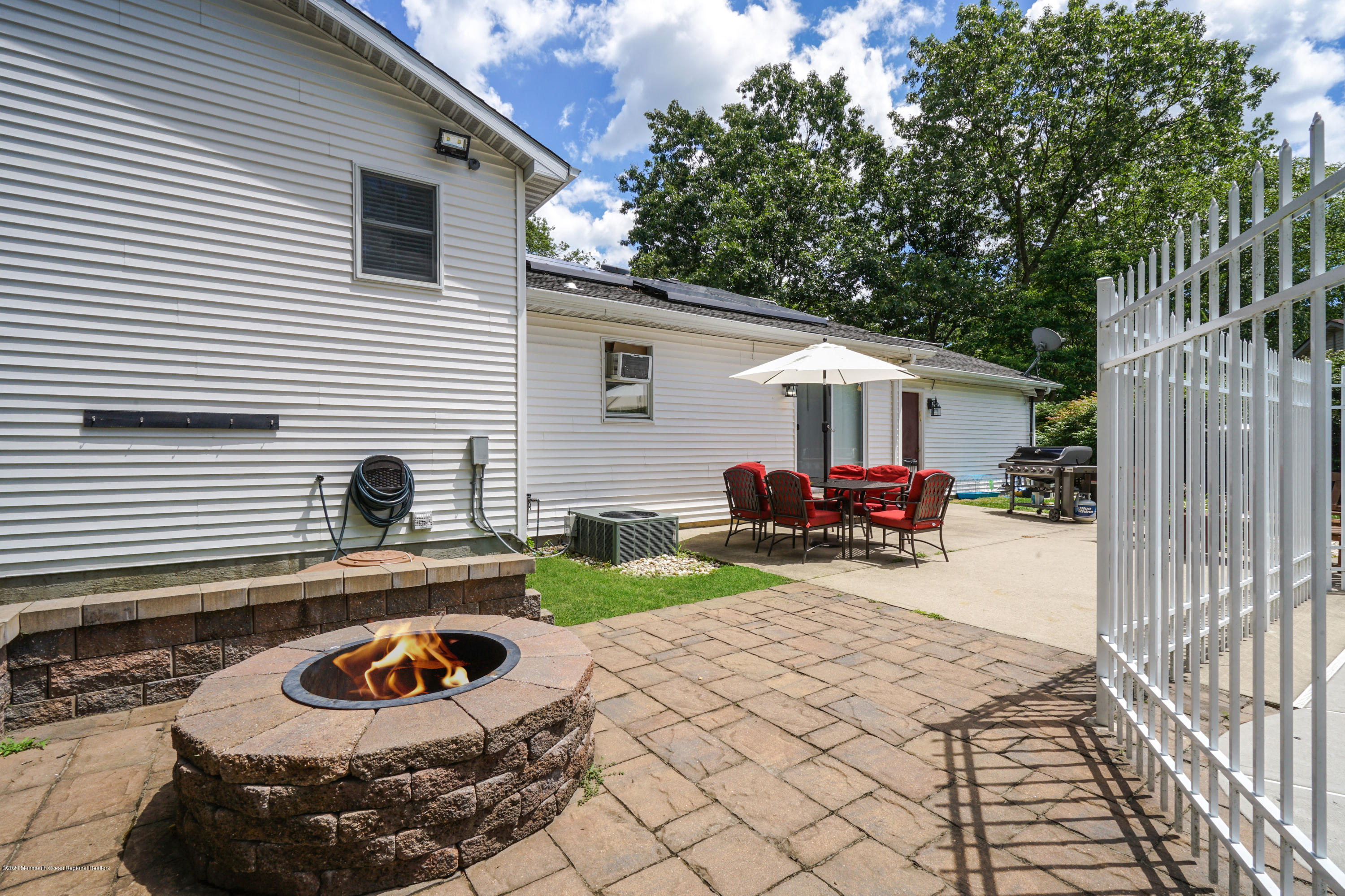 92 Hickory Hill Road Jackson, NJ 08527 - Photo 34 of 43 Paver Patio with Fire Pit