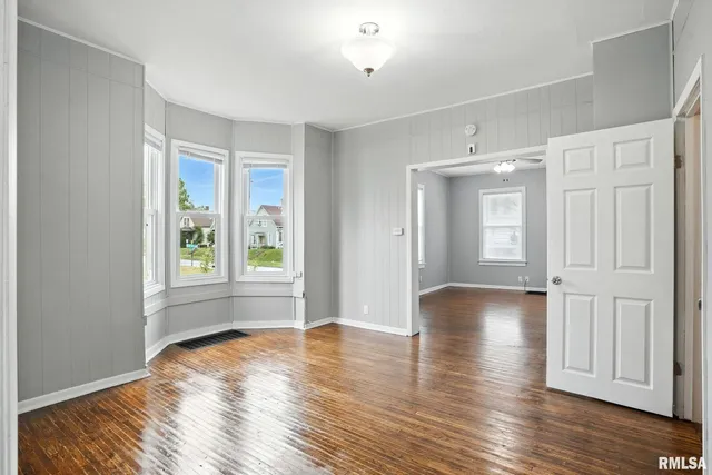 a view of livingroom with hardwood floor and hallway