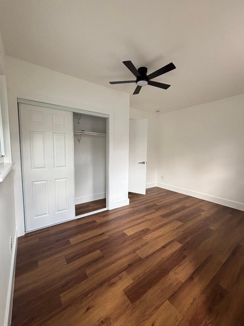 5724 Seton Drive Margate, FL 33063 - Photo 11 of 12 a view of empty room with wooden floor