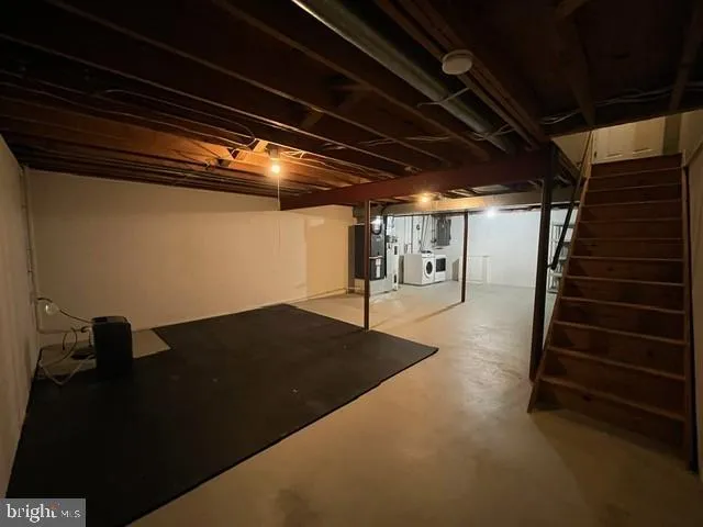 a view of a hallway with stairs