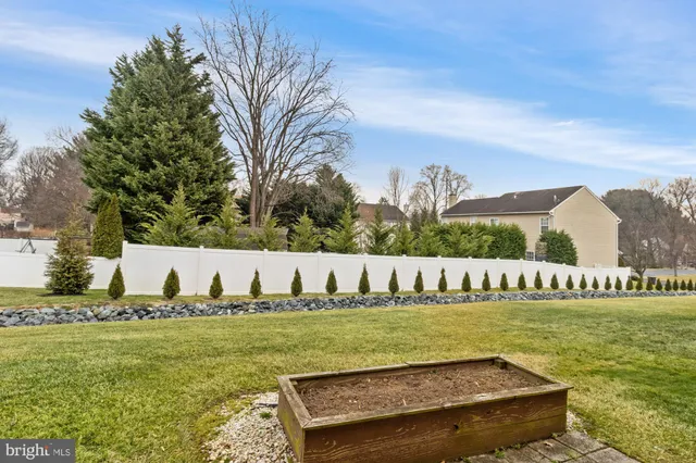 a view of swimming pool with a yard