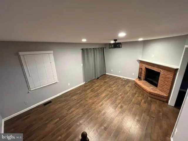 a view of a livingroom with a fireplace
