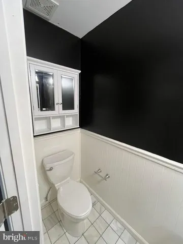 a bathroom with a toilet