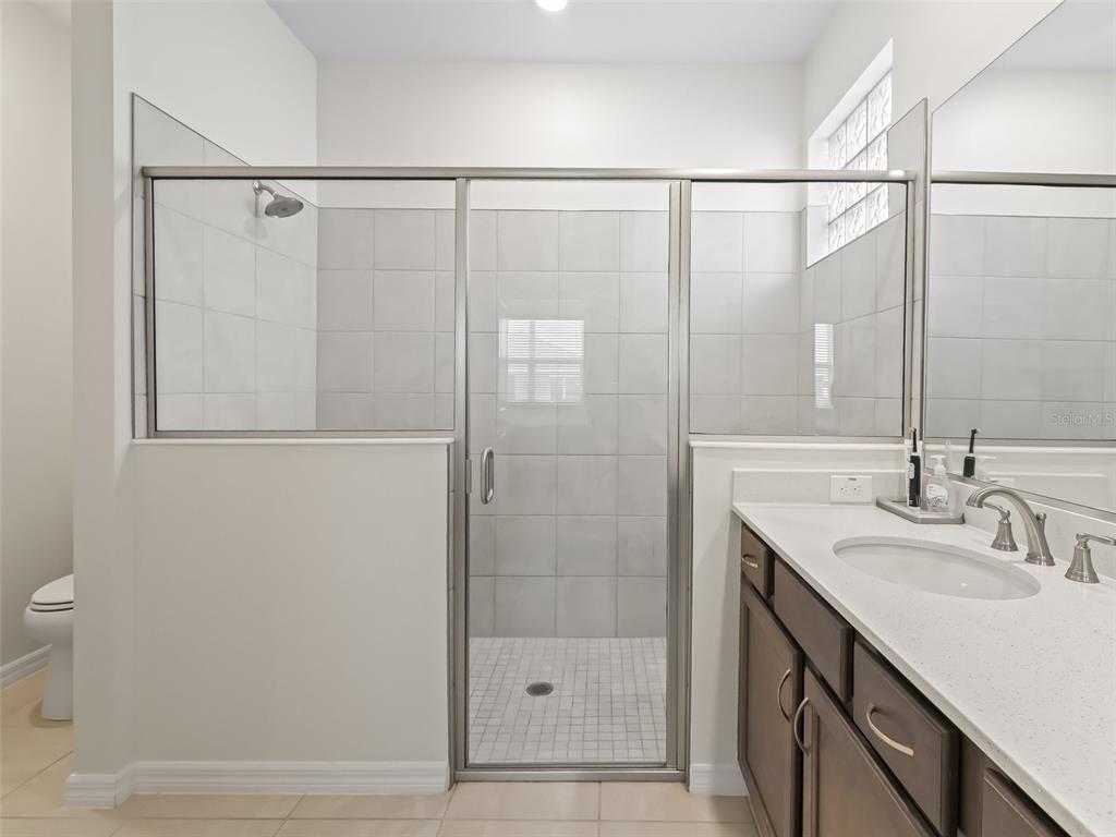 7206 Southwest 60th Lane Ocala, FL 34474 - Photo 24 of 50 a bathroom with a shower and a sink