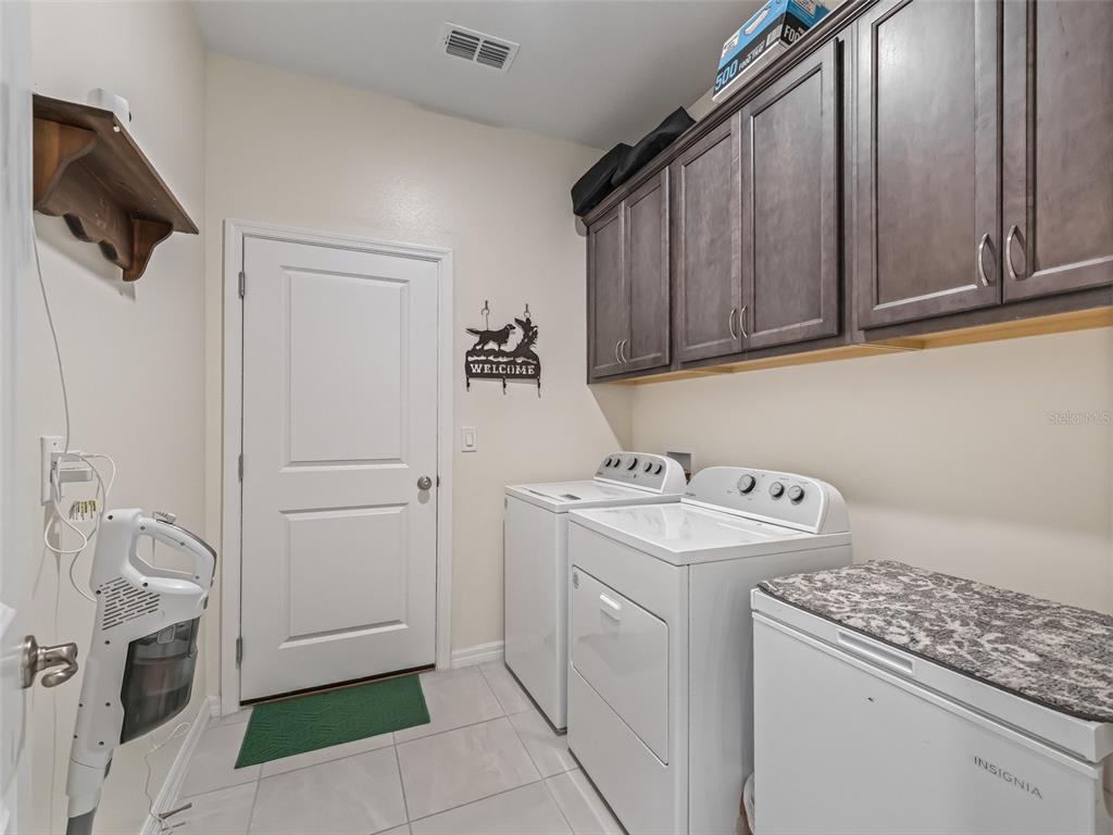 7206 Southwest 60th Lane Ocala, FL 34474 - Photo 35 of 50 a utility room with dryer and washer