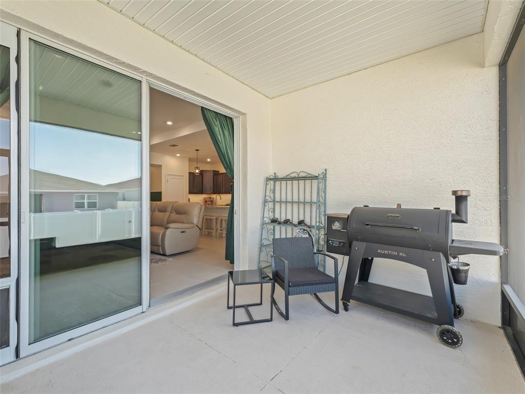 7206 Southwest 60th Lane Ocala, FL 34474 - Photo 37 of 50 a view of a workspace with furniture and a livingroom