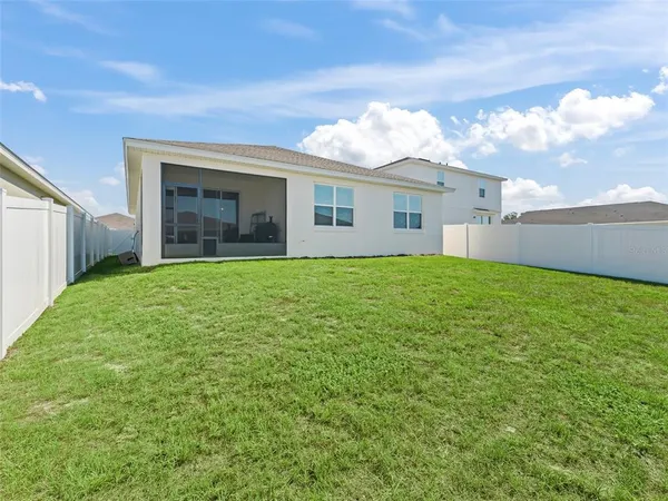 a view of a yard in front of a house