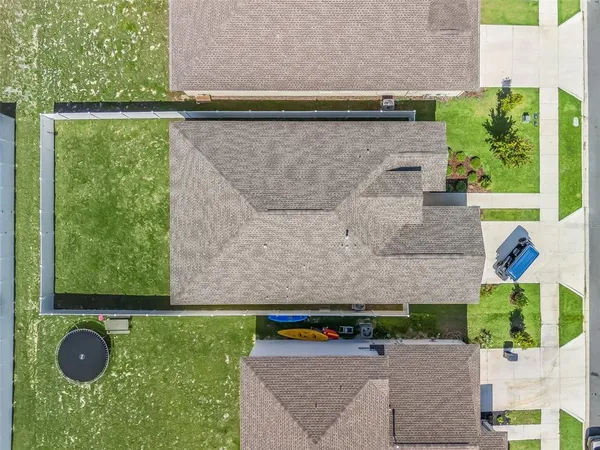 a stone house with a yard