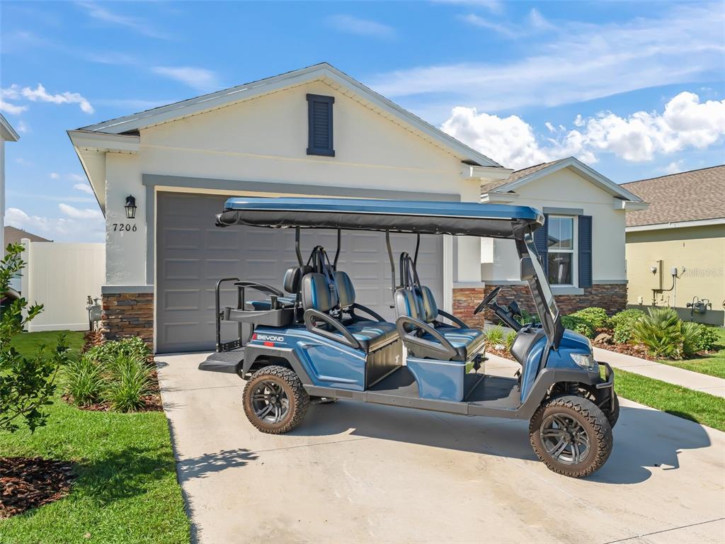 7206 Southwest 60th Lane Ocala, FL 34474 - Photo 49 of 50 a view of car parked in front of house