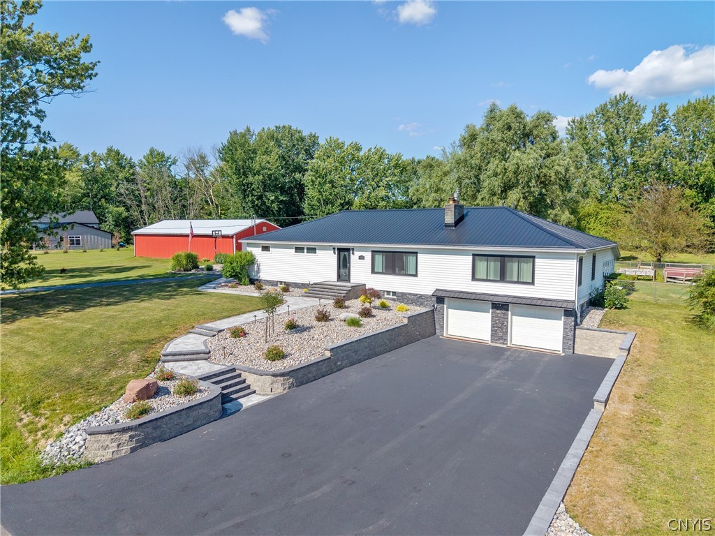9702 Caughdenoy Road Clay, NY 13029 - Photo 3 of 50