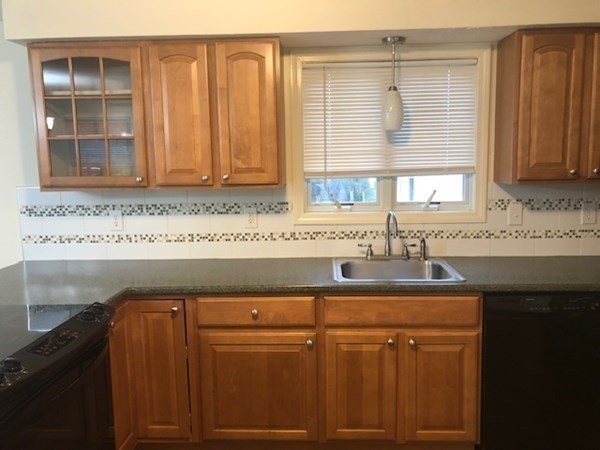 60 Cushing Road Webster, MA 01570 - Photo 11 of 30 a bathroom with a sink and a mirror