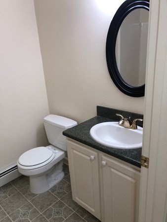 60 Cushing Road Webster, MA 01570 - Photo 16 of 30 a bathroom with a sink and a mirror