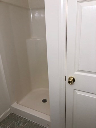 60 Cushing Road Webster, MA 01570 - Photo 22 of 30 a bathroom with a shower
