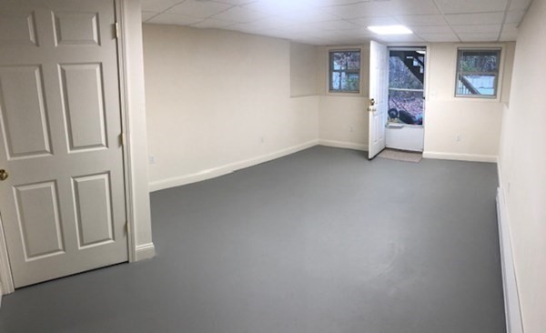 60 Cushing Road Webster, MA 01570 - Photo 28 of 30 an empty room with entrance and stairs