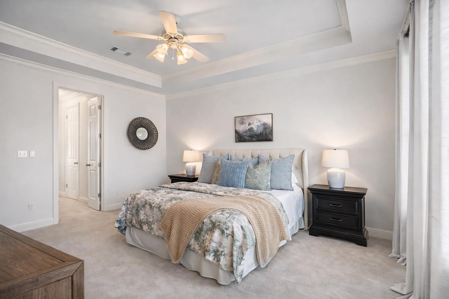 10257 Old Course Cove Collierville, TN 38017 - Photo 26 of 38 a bedroom with a bed and a chandelier