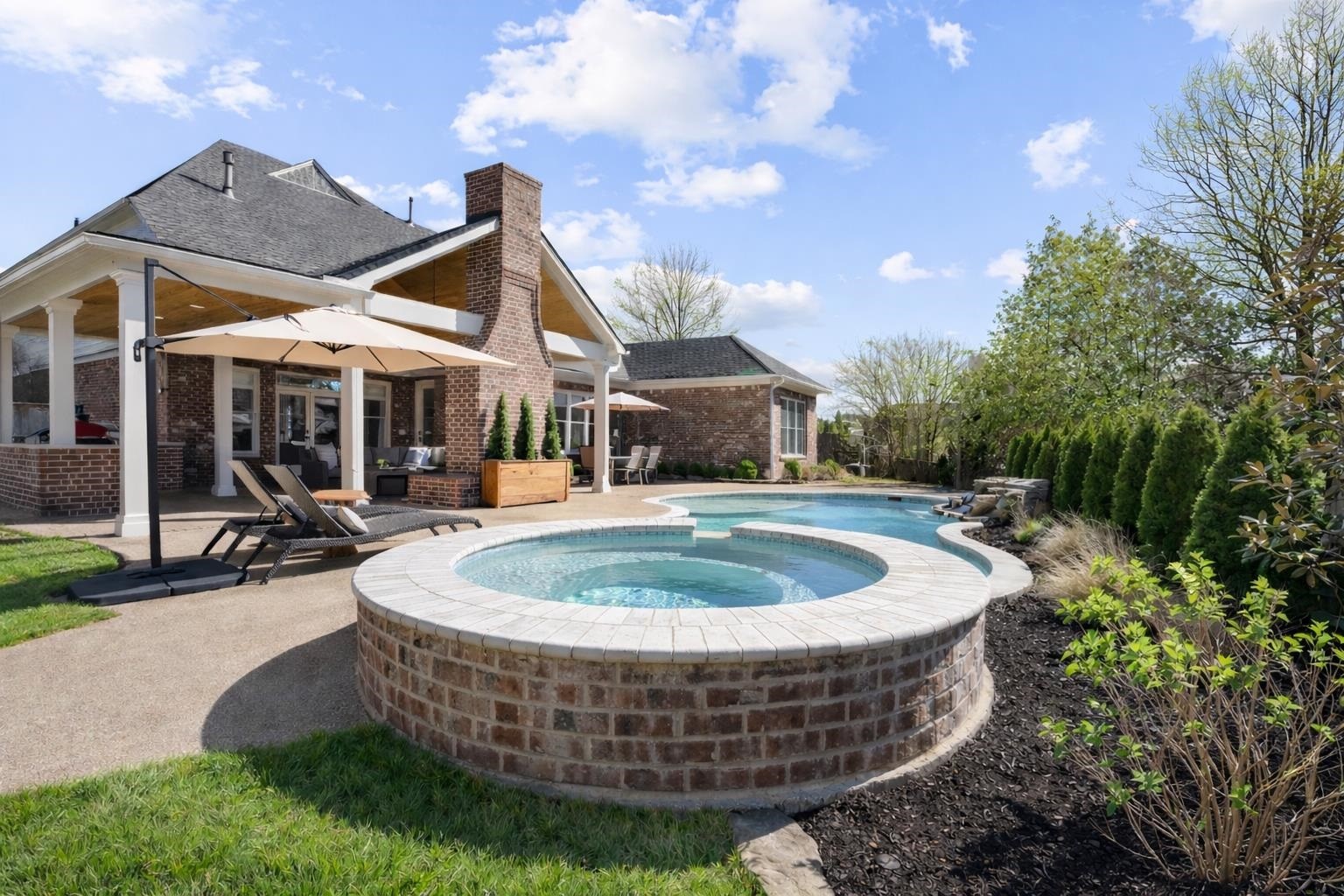 10257 Old Course Cove Collierville, TN 38017 - Photo 5 of 38 a view of a house with sitting area and garden