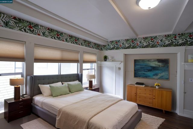 a kitchen with stainless steel appliances a stove a sink and a refrigerator