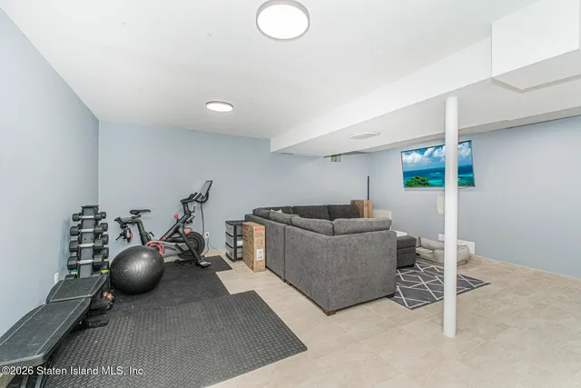 a living room with furniture and a table