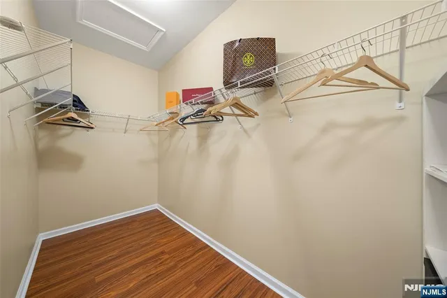 a view of a room with racks on the wall