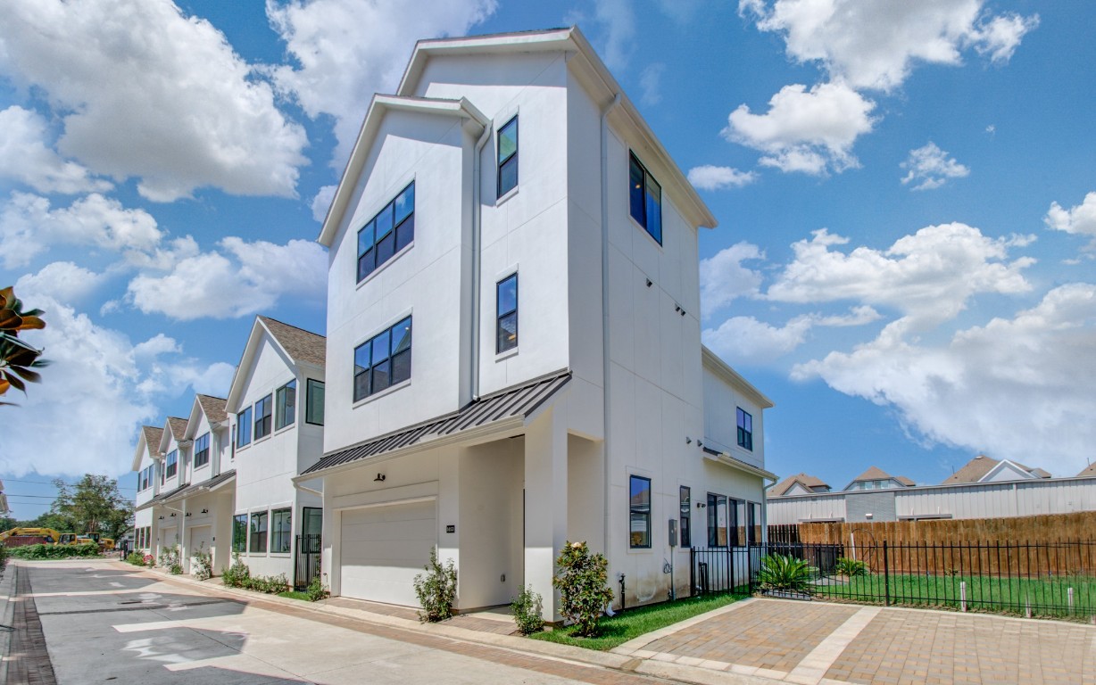 1645 Bingle Road Houston, TX 77055 - Photo 2 of 50 a view of a street with a building in the background