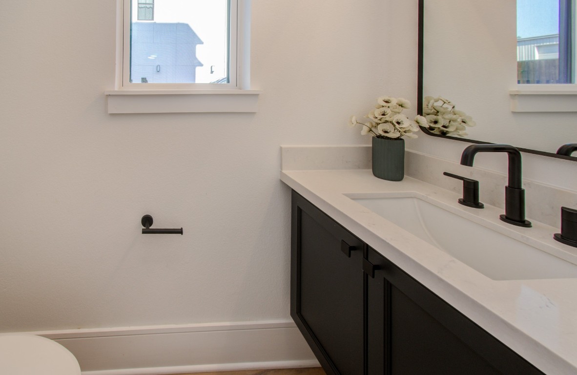 1645 Bingle Road Houston, TX 77055 - Photo 9 of 50 a bathroom with a sink and a mirror