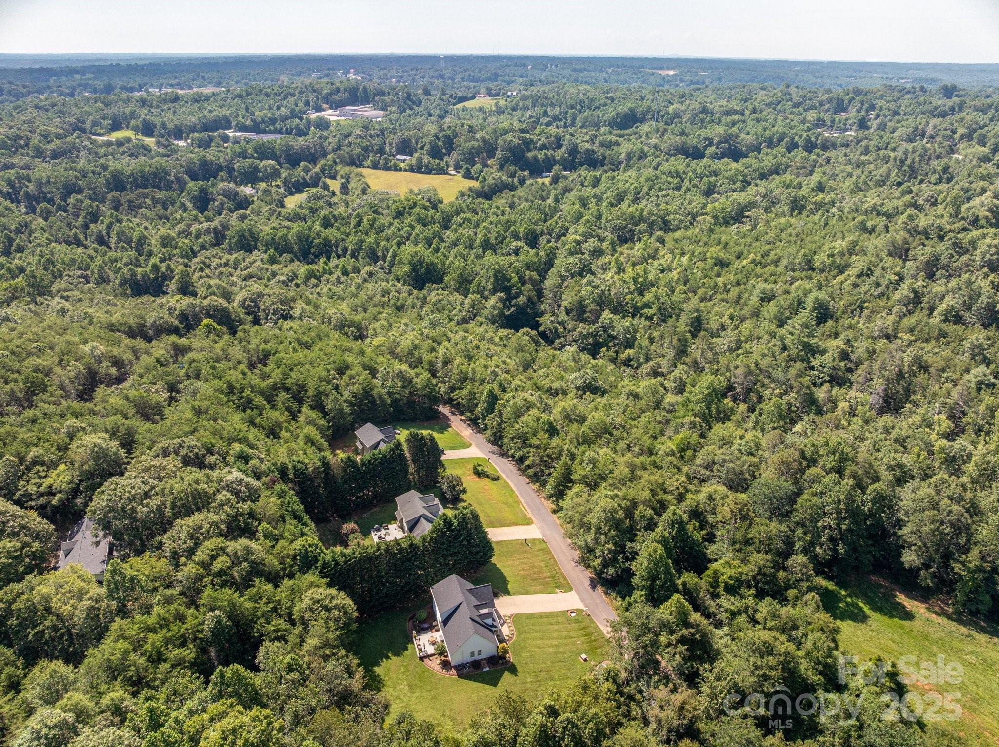 Lot 7 Meadow Crossing Drive Rutherfordton, NC 28139 - Photo 4 of 15 an aerial view of a house with a yard