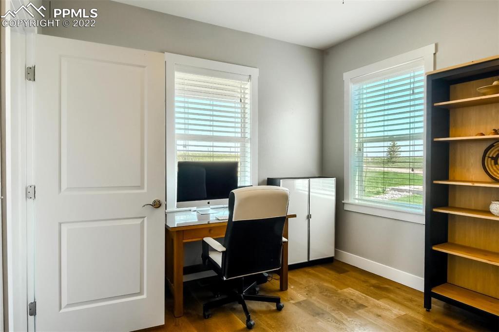 34698 Southern Cross Loop Kiowa, CO 80117 - Photo 31 of 50 a view of a workspace with furniture and a window