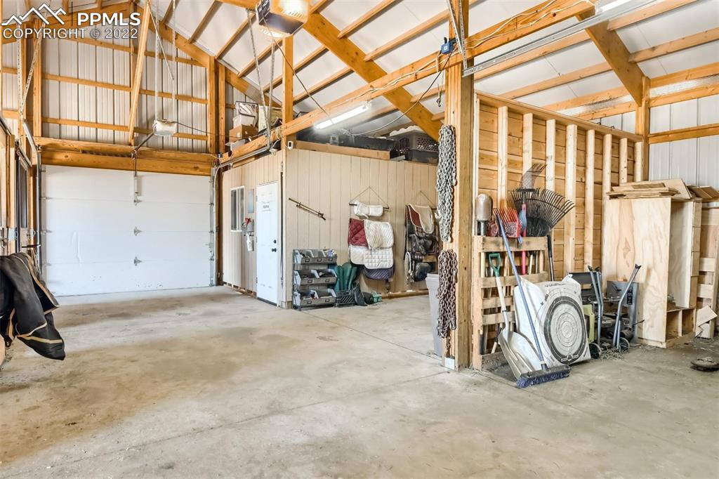 34698 Southern Cross Loop Kiowa, CO 80117 - Photo 37 of 50 a view of a garage with rack and bicycle