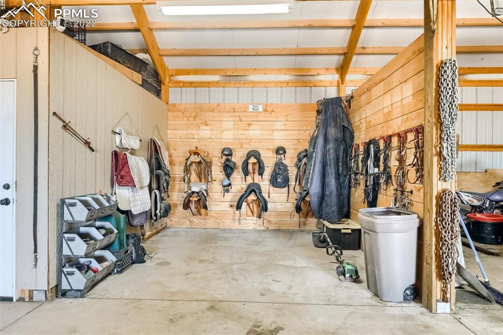 34698 Southern Cross Loop Kiowa, CO 80117 - Photo 38 of 50 a view of walk in closet with clothes and shoes