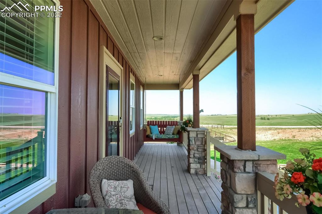 34698 Southern Cross Loop Kiowa, CO 80117 - Photo 4 of 50 a outdoor living space with furniture and garden view