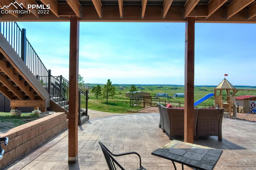 34698 Southern Cross Loop Kiowa, CO 80117 - Photo 47 of 50 a view of a floor to ceiling window with wooden floor