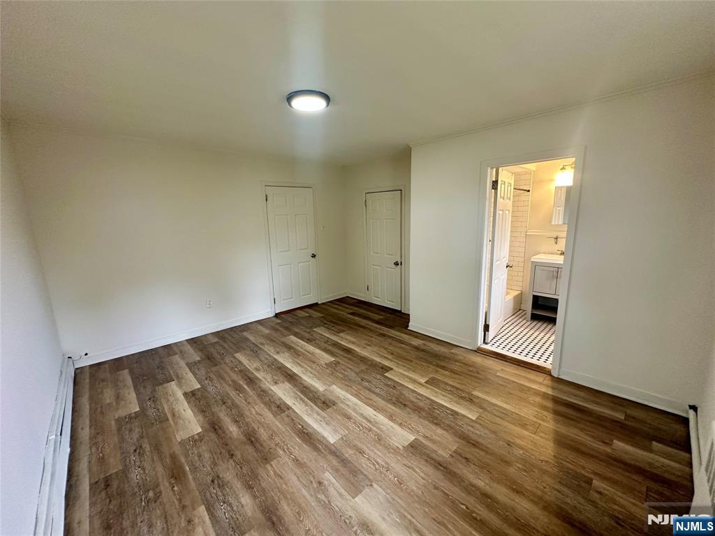 390 Orange Road Montclair, NJ 07042 - Photo 9 of 16 a view of empty room with wooden floor