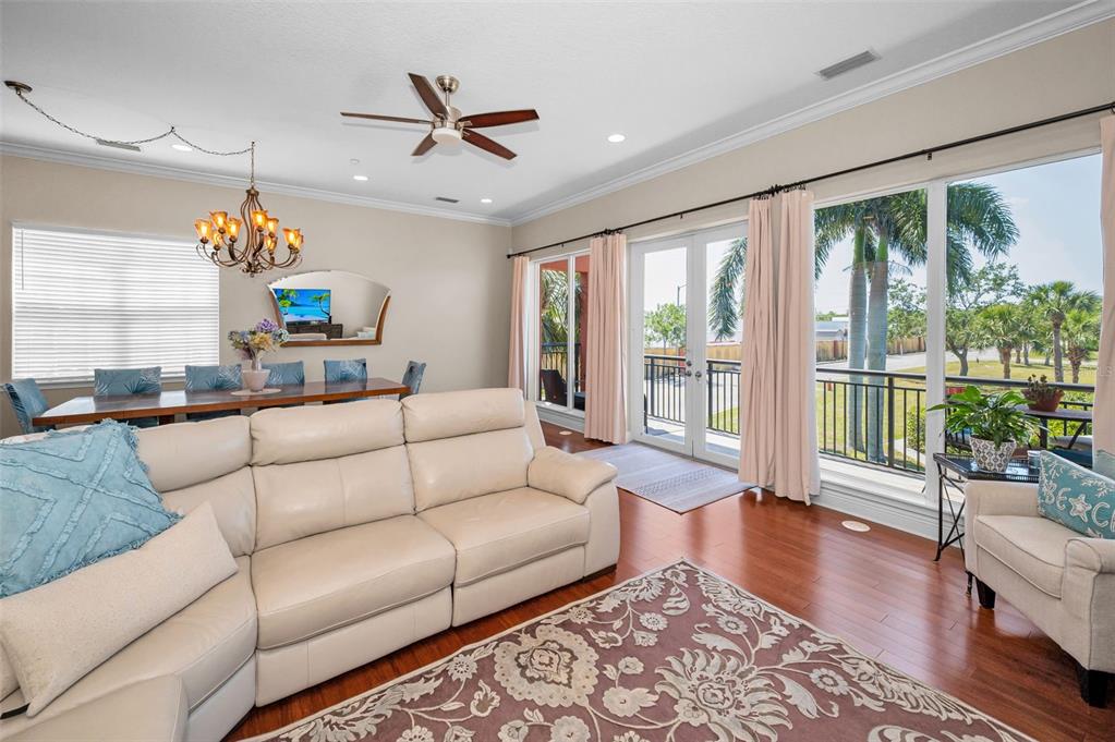 47 West Morgan Street Tarpon Springs, FL 34689 - Photo 19 of 64 a living room with furniture and a large window
