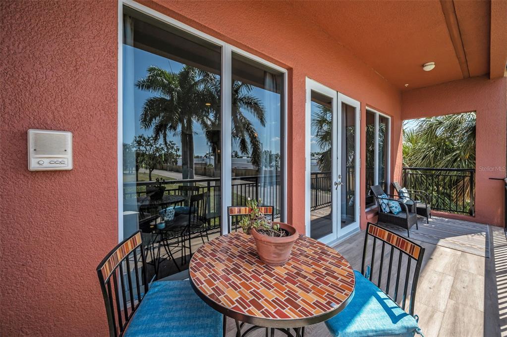 47 West Morgan Street Tarpon Springs, FL 34689 - Photo 24 of 64 a view of a balcony with furniture